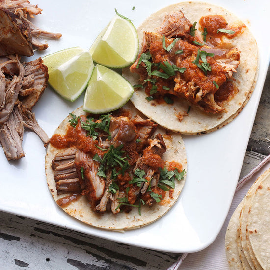 sous vide carnitas on corn tortillas with red salsa